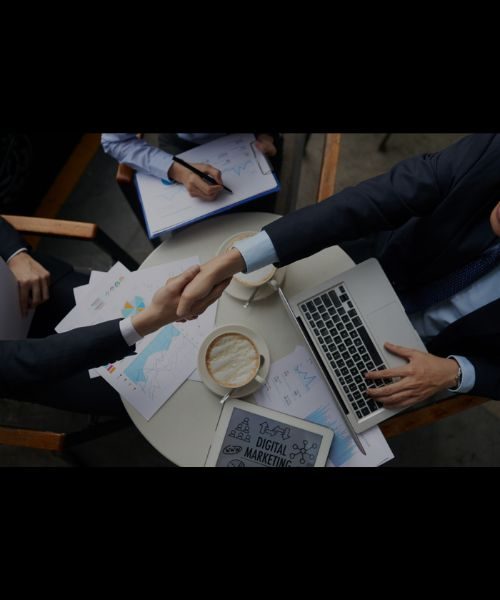 Digital Expert shaking hand with a client.